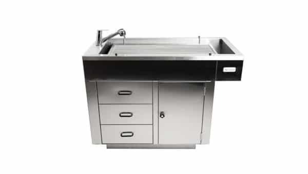Mesa humeda para veterinaria con 1 puerta y 3 gavetas.